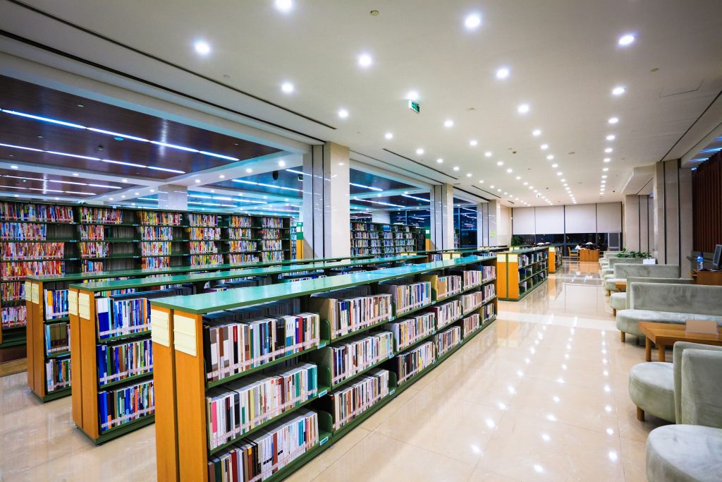 20878894 - modern library interior,library setting with books and reading area